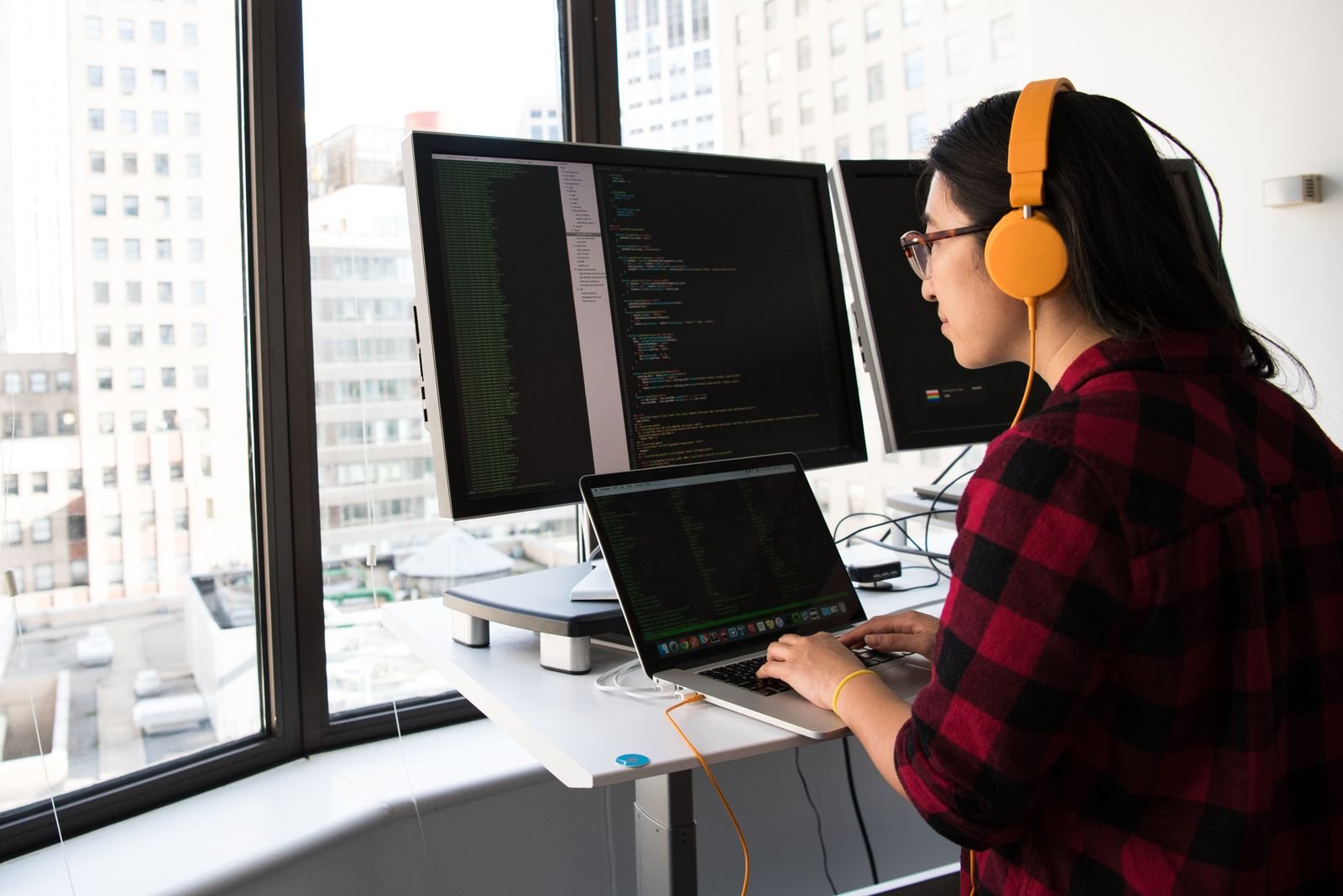 Developer building a site at her desk