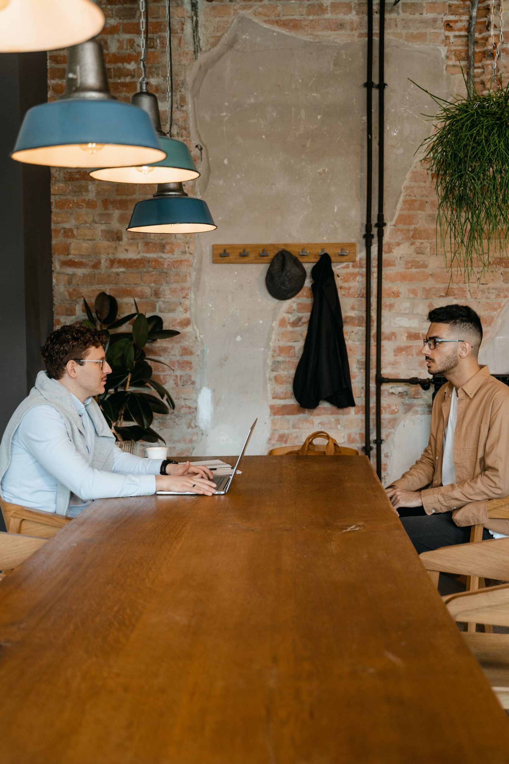 An agency owner interviewing a developer candidate