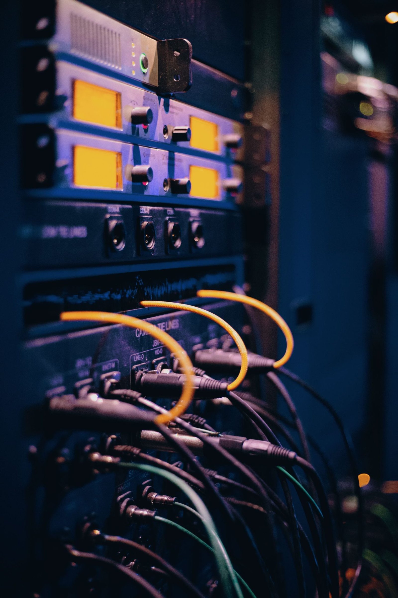 Network cables plugged into a server rack in a data centre