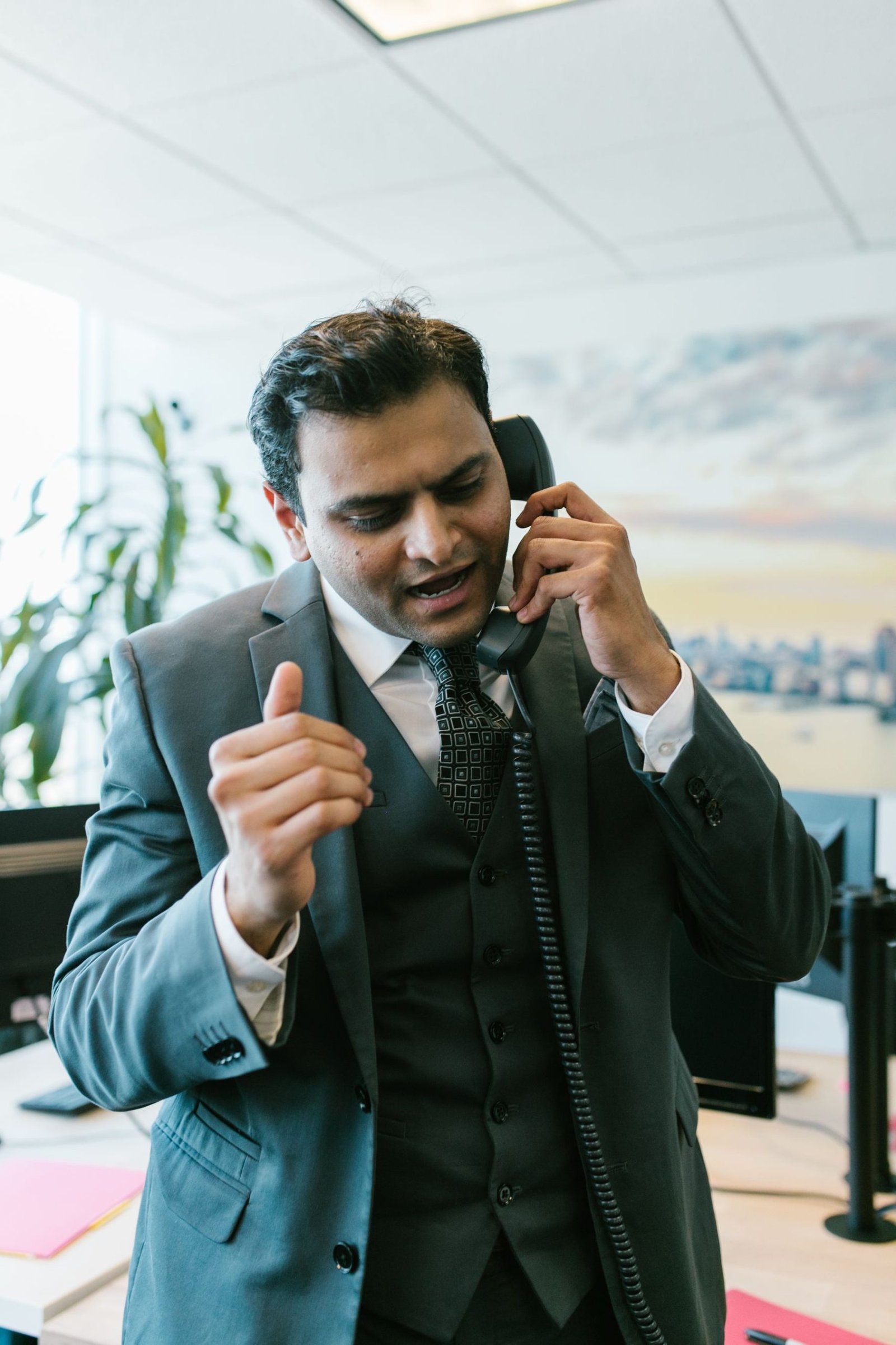 An agency owner on a tense phone call with a client
