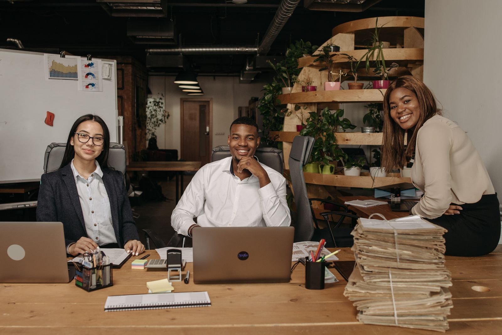 Team members working at their desks in the office