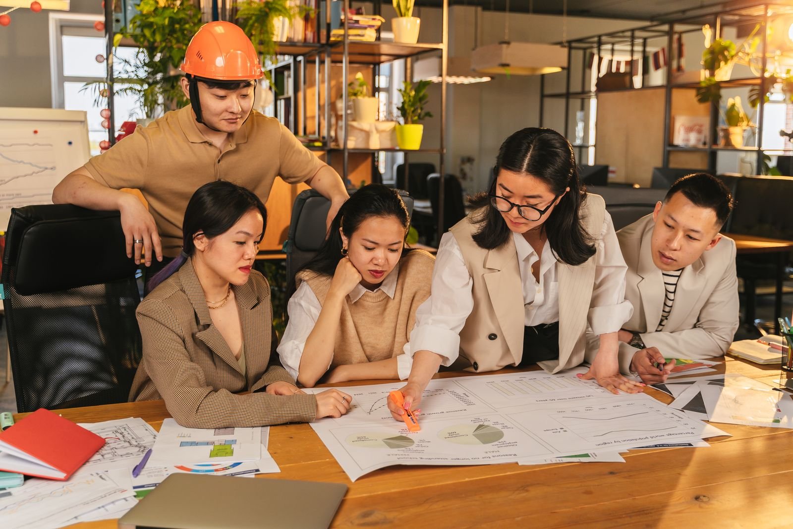 New team members reviewing plans together