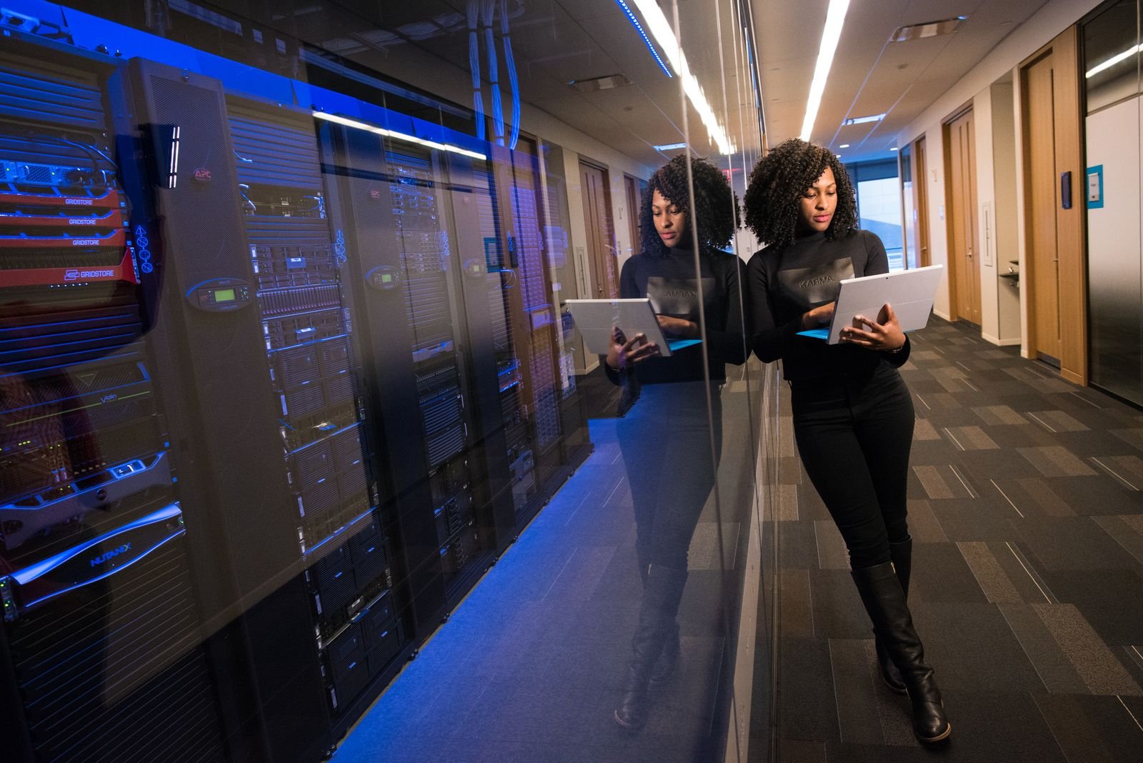Engineers checking servers in a data center