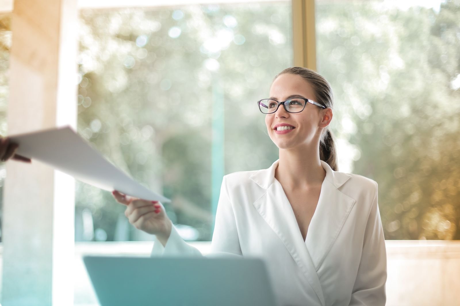 Marketer reviewing campaign results at her laptop
